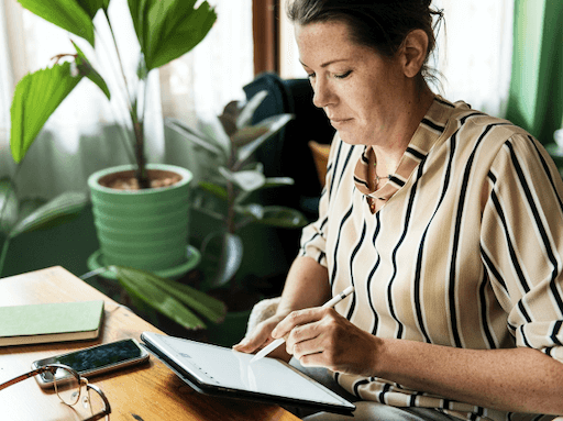 Woman working on tablet